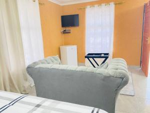 Μια τηλεόραση ή/και κέντρο ψυχαγωγίας στο Muzee Wethu Accommodations