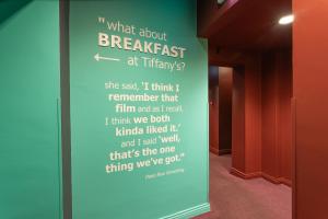 a sign that says what about breakfast at thir in a hallway at Skeffington Arms Hotel in Galway