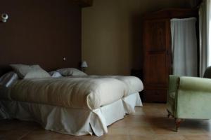 Posteľ alebo postele v izbe v ubytovaní CASA REBOLLARES IIBIS