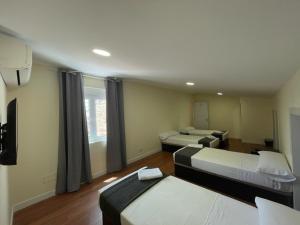 Кровать или кровати в номере Chalet Pension Rooms Abril