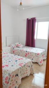 Llit o llits en una habitació de 3 bedrooms apartement at Arrecife 800 m away from the beach with balcony and wifi