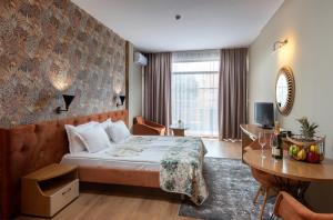 Postel nebo postele na pokoji v ubytování Hotel Avenue + 37 fotografií