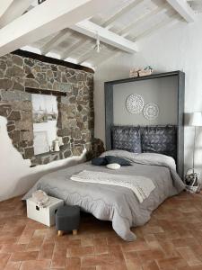 Postel nebo postele na pokoji v ubytování B&B Roseddu