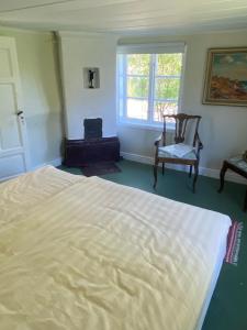 Postel nebo postele na pokoji v ubytování Ingmarsö B&B