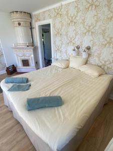 Postel nebo postele na pokoji v ubytování Ingmarsö B&B