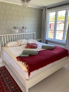 Postel nebo postele na pokoji v ubytování Ingmarsö B&B