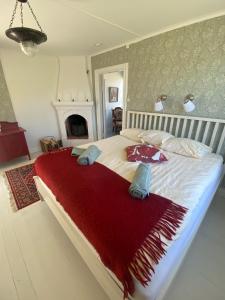 Postel nebo postele na pokoji v ubytování Ingmarsö B&B