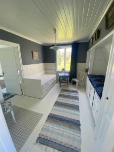 Postel nebo postele na pokoji v ubytování Ingmarsö B&B