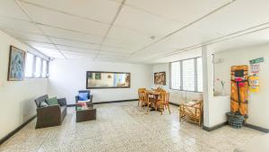 TV a/nebo společenská místnost v ubytování Hotel Casa Telma