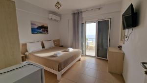 TV i/ili multimedijalni sistem u objektu Horizon view rooms