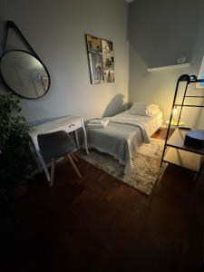 Postel nebo postele na pokoji v ubytování Residencial Funchal