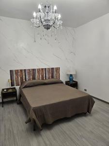 Postel nebo postele na pokoji v ubytování B&B IL Pistacchio