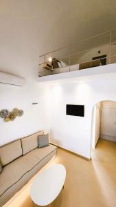 Posezení v ubytování HAYAL SUITES SANTORINI