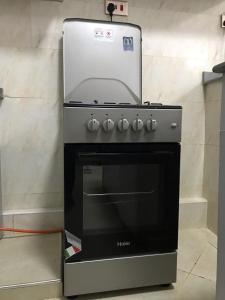 a silver stove with aperature at JnB Naivasha town 1Bedroom in Naivasha