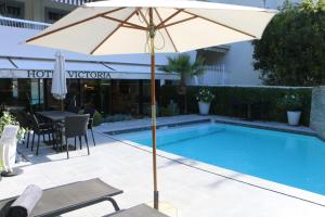 Kolam renang di atau di dekat Hôtel Victoria