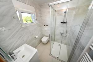 Kúpeľňa v ubytovaní Villa Gravic 1