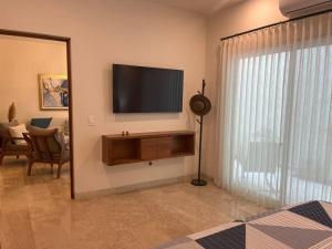 Et tv og/eller underholdning på Bello departamento en Costa Azul