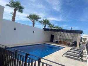 Swimmingpoolen hos eller tæt på Bello departamento en Costa Azul