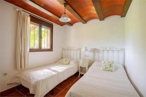 Posteľ alebo postele v izbe v ubytovaní Huerto Los Castaños + 7 fotografií