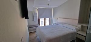 Postel nebo postele na pokoji v ubytování Hotel La Quinta