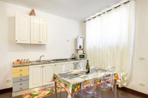 Kuchyň nebo kuchyňský kout v ubytování Deluxe Apartments Pantheon
