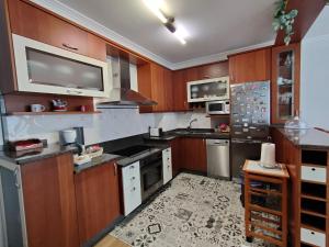 Kuchyňa alebo kuchynka v ubytovaní Apartamento Xanela o Mar