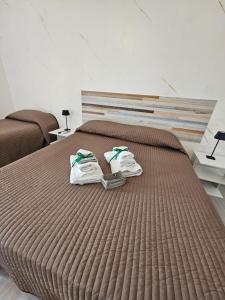 Postel nebo postele na pokoji v ubytování B&B IL Pistacchio
