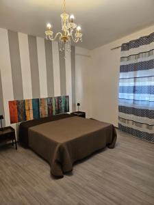 Postel nebo postele na pokoji v ubytování B&B IL Pistacchio