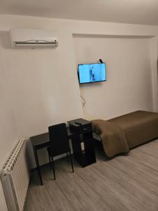 TV a/nebo společenská místnost v ubytování B&B IL Pistacchio