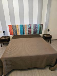 Postel nebo postele na pokoji v ubytování B&B IL Pistacchio