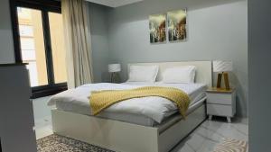 Letto o letti in una camera di 2 BHK Townhouse at Pearl