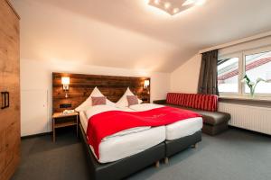 Rúm í herbergi á Hotel Tradizio