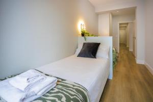 Ліжко або ліжка в номері Apartamento Mandoia by Bilbaohost