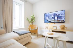 Телевізор і / або розважальний центр в Apartamento Mandoia by Bilbaohost