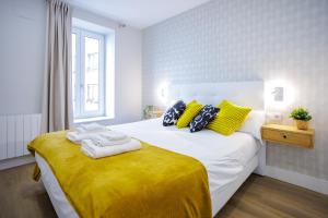 Letto o letti in una camera di VT Mandoia by Bilbaohost