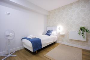 Letto o letti in una camera di VT Mandoia by Bilbaohost