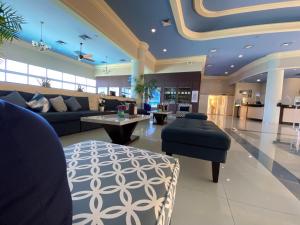 a large living room with a couch and a table at Simpson Bay Resort Marina & Spa in Simpson Bay