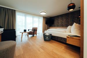 Rúm í herbergi á Hotel Tradizio