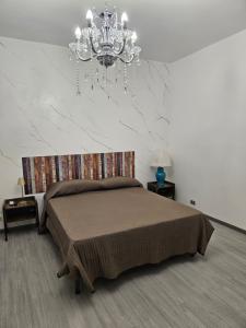 Postel nebo postele na pokoji v ubytování B&B IL Pistacchio