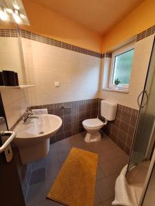 Ein Badezimmer in der Unterkunft Villa HAUS NIKO