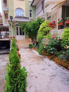 A garden outside Family Hotel Selena