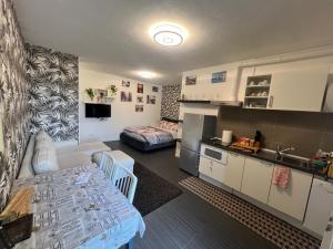 Kuchyň nebo kuchyňský kout v ubytování Apartment Tazzoli 11
