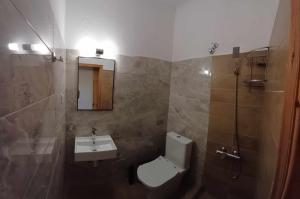 Ένα μπάνιο στο Apartments Stilos Ioannis