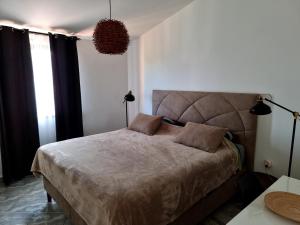 Postel nebo postele na pokoji v ubytování Apartments Noa
