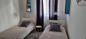 Postel nebo postele na pokoji v ubytování Apartments Noa