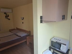 Posteľ alebo postele v izbe v ubytovaní Ilona Apartmanház