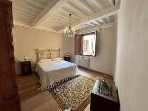 Ένα ή περισσότερα κρεβάτια σε δωμάτιο στο Casa Letizia