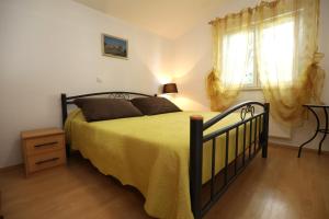 Posteľ alebo postele v izbe v ubytovaní Apartments Salona