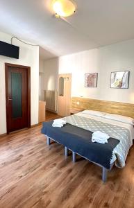 Katil atau katil-katil dalam bilik di Albergo Varone