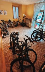 a group of bikes parked in a living room at Albergo Varone in Riva del Garda